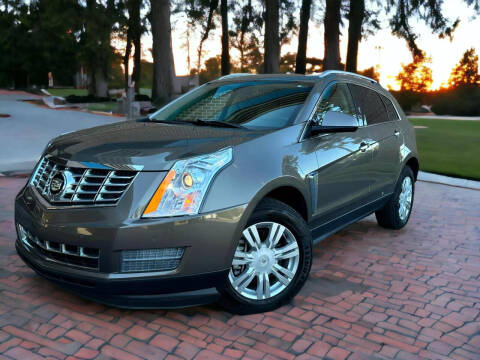 2015 Cadillac SRX for sale at Carma Auto Group in Duluth GA