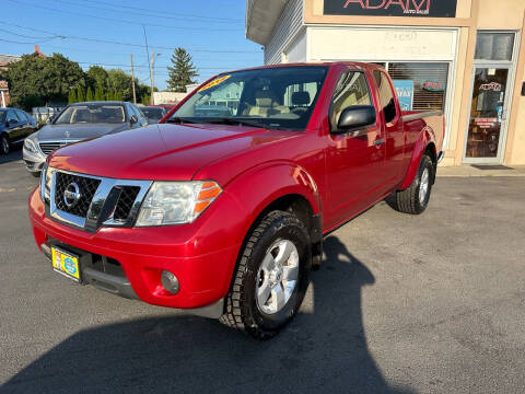 2012 Nissan Frontier for sale at ADAM AUTO AGENCY in Rensselaer NY