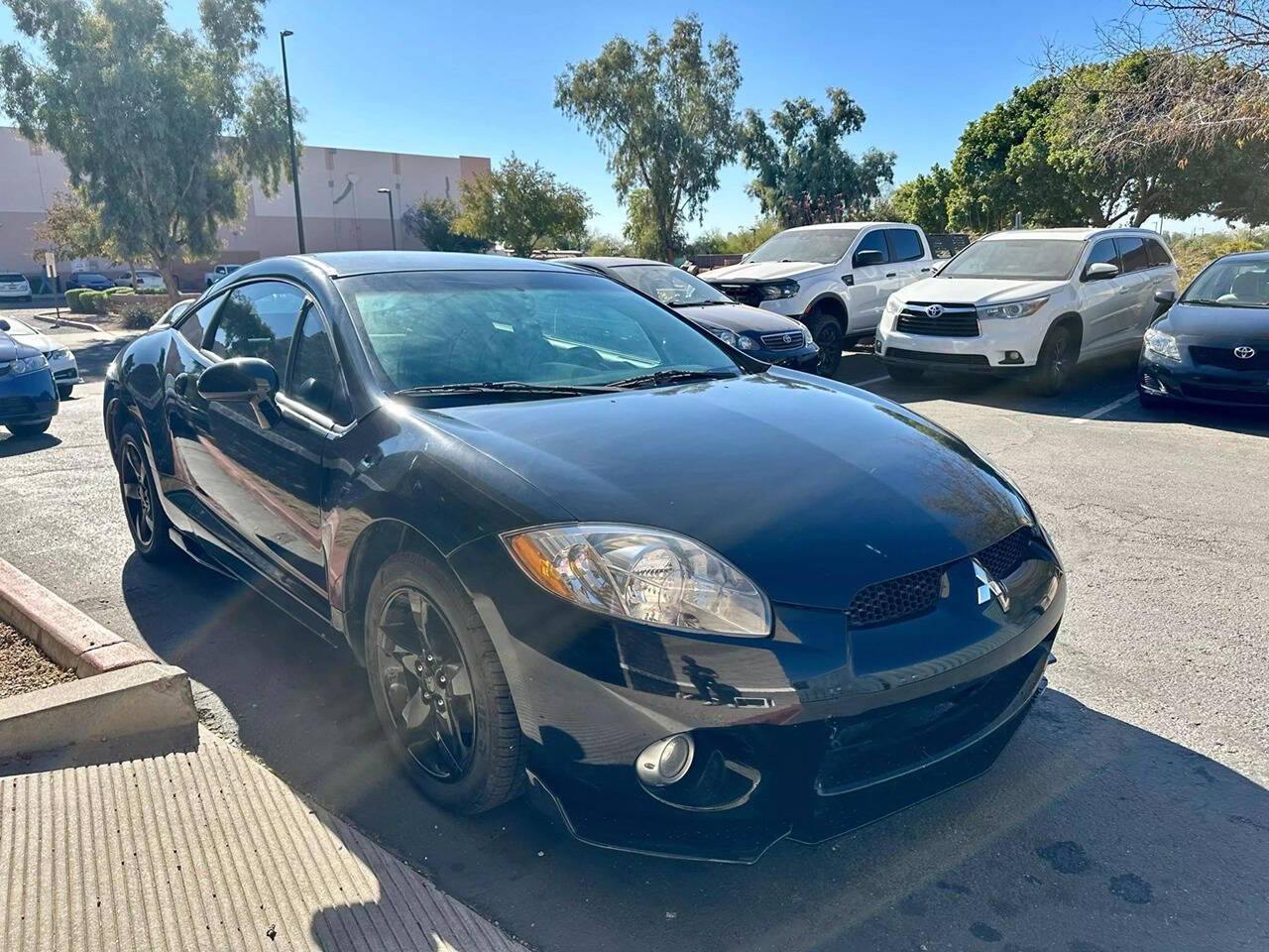 2006 Mitsubishi Eclipse for sale at HUDSONS AUTOS in Gilbert, AZ