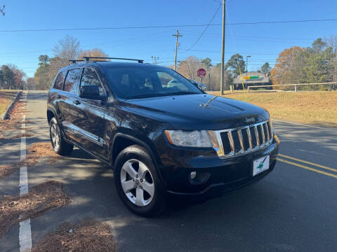 2013 Jeep Grand Cherokee for sale at THE AUTO FINDERS in Durham NC