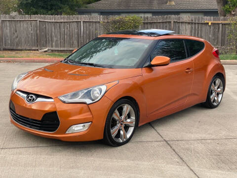 2012 Hyundai Veloster for sale at KM Motors LLC in Houston TX