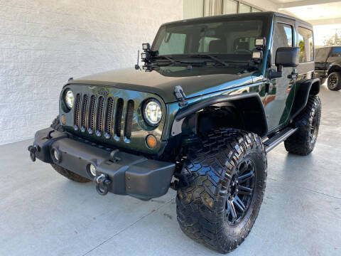 2011 Jeep Wrangler for sale at Powerhouse Automotive in Tampa FL