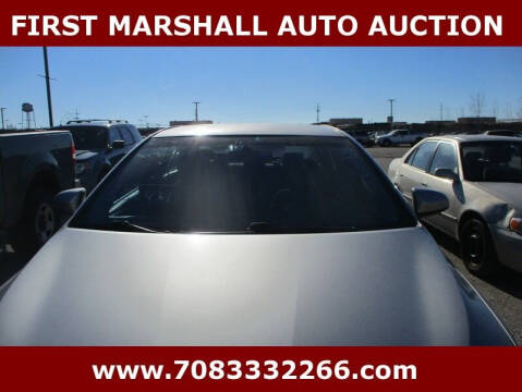 2016 Toyota Camry for sale at First Marshall Auto Auction in Harvey IL