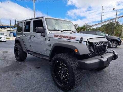 2014 Jeep Wrangler Unlimited for sale at Select Autos Inc in Fort Pierce FL