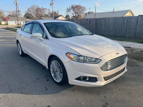 2016 Ford Fusion for sale at Ideal Auto Sales in Dunn NC