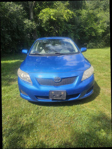 2009 Toyota Corolla for sale at T & Q Auto in Cohoes NY