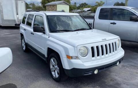 2013 Jeep Patriot for sale at VILLAGE AUTO MART LLC in Portage IN