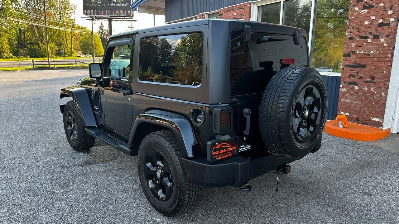 2016 Jeep Wrangler for sale at North Ridge Auto Center LLC in Madison, OH