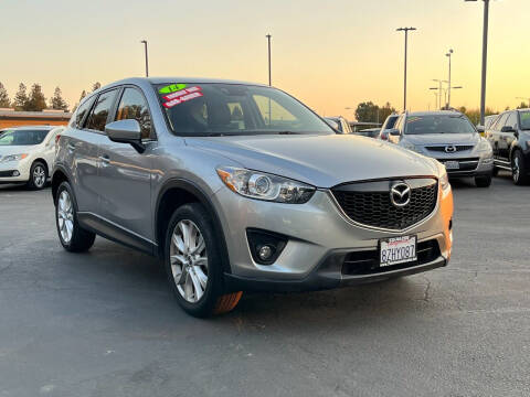 2014 Mazda CX-5 for sale at FABULOUS AUTO SALES in Davis CA