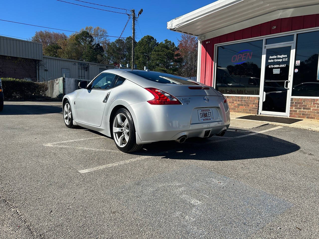 2009 Nissan 370Z for sale at Justin Hughes Auto Group LLC in Douglasville, GA