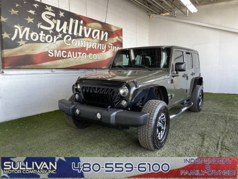 2015 Jeep Wrangler Unlimited for sale at SULLIVAN MOTOR COMPANY INC. in Mesa AZ