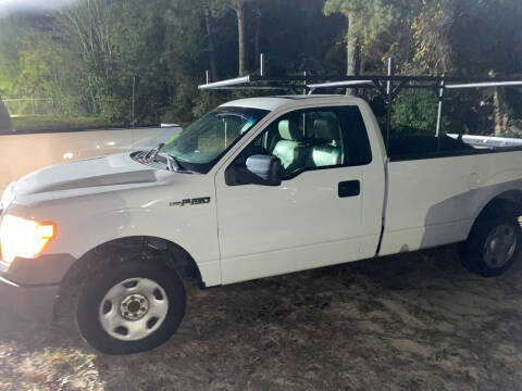 2009 Ford F-150 for sale at TOP OF THE LINE AUTO SALES in Fayetteville NC
