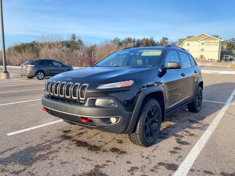 2017 Jeep Cherokee for sale at Rams Auto Sales LLC in South Saint Paul MN