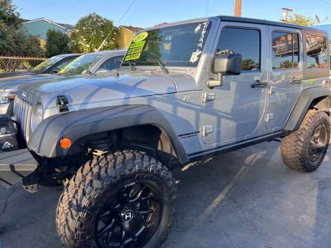 2016 Jeep Wrangler Unlimited for sale at LA PLAYITA AUTO SALES INC in South Gate CA