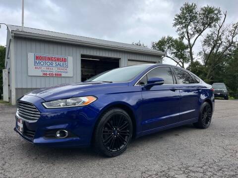 2013 Ford Fusion for sale at HOLLINGSHEAD MOTOR SALES in Cambridge OH