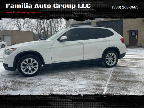 2013 BMW X1 for sale at Familia Auto Group LLC in Massillon OH