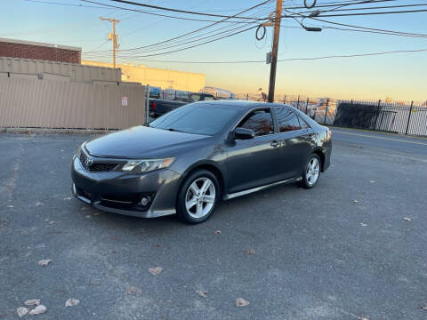 2013 Toyota Camry for sale at A1 Auto Mall LLC in Hasbrouck Heights NJ