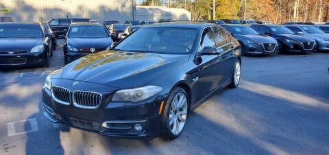 2014 BMW 5 Series for sale at GEORGIA AUTO DEALER LLC in Buford GA