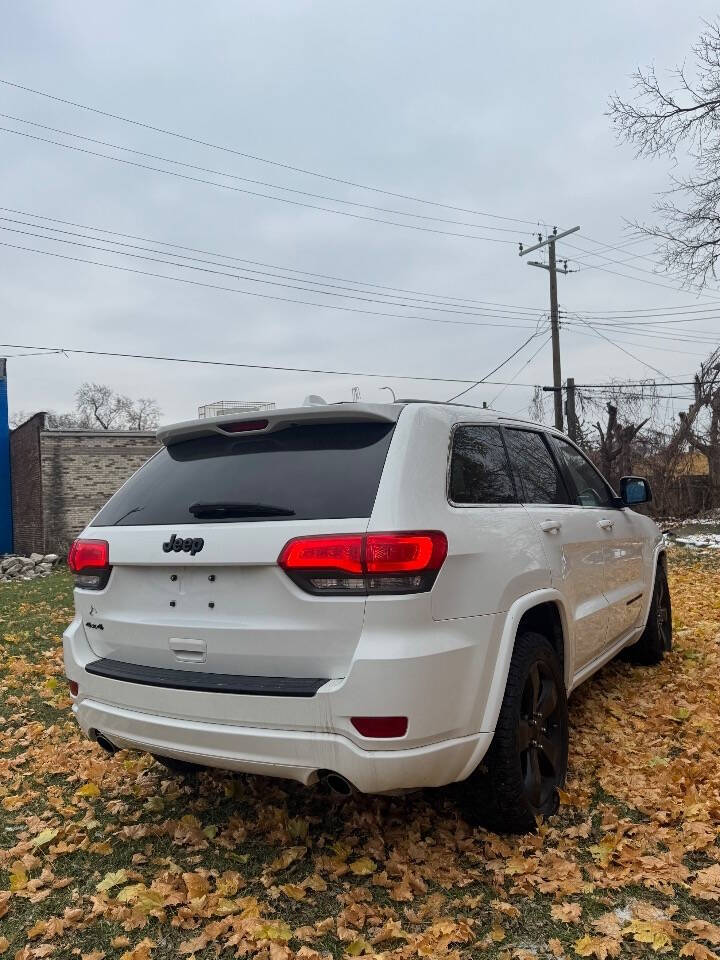 2014 Jeep Grand Cherokee for sale at H & H AUTO GROUP in Detroit, MI