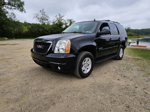 2013 GMC Yukon for sale at Rombaugh's Auto Sales in Battle Creek MI