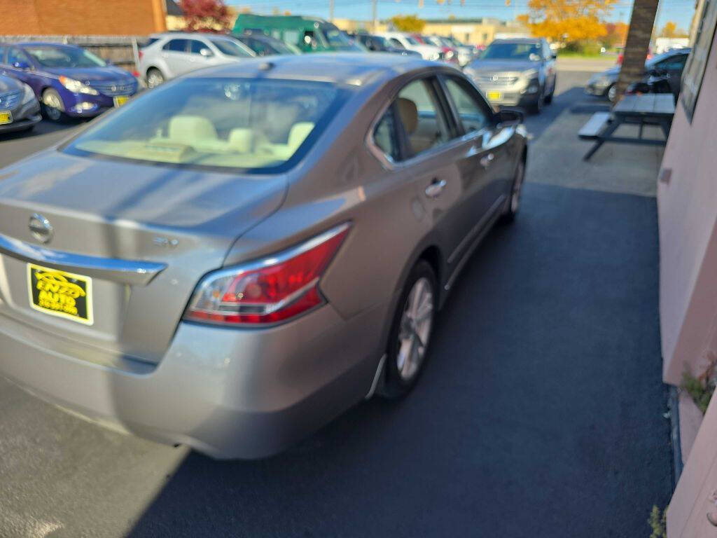 2015 Nissan Altima for sale at ENZO AUTO in Parma, OH