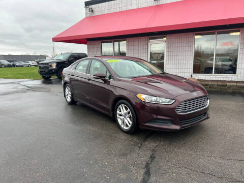 2013 Ford Fusion for sale at Everyone's Financed At Borgman - BORGMAN OF HOLLAND LLC in Holland MI