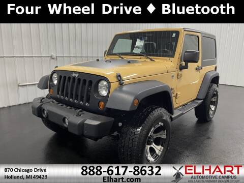 2013 Jeep Wrangler for sale at Elhart Automotive Campus in Holland MI