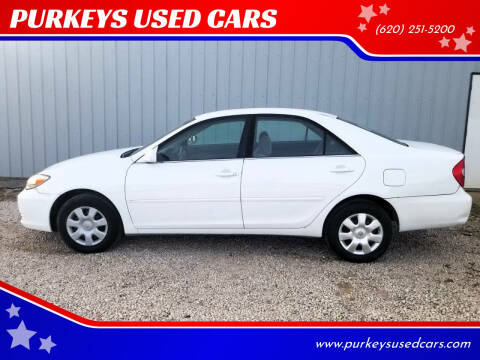 2002 Toyota Camry for sale at PURKEYS USED CARS in Coffeyville KS