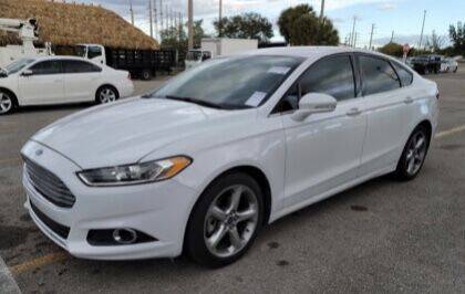 2014 Ford Taurus for sale at The Car Store in Milford MA