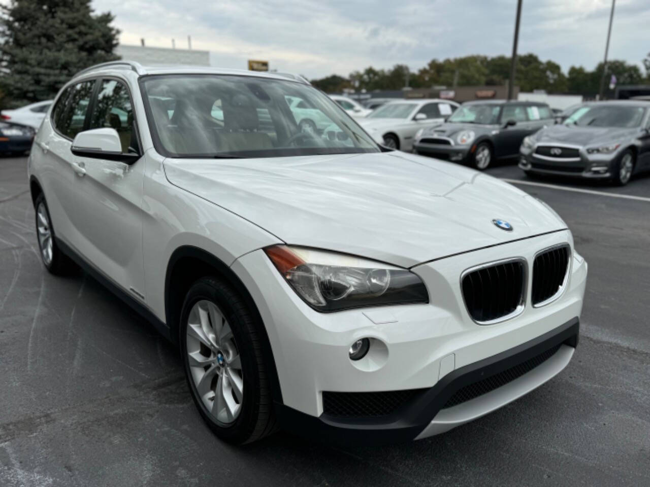 2013 BMW X1 for sale at Opus Motorcars in Utica, MI