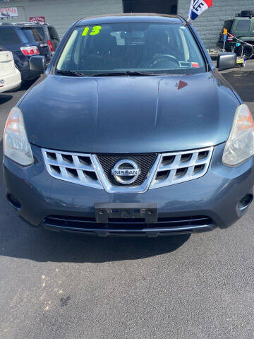 2013 Nissan Rogue for sale at Right Choice Automotive in Rochester NY