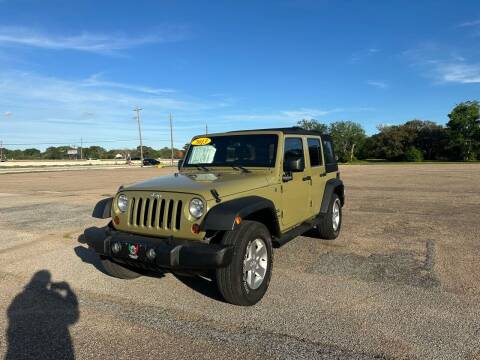 2013 Jeep Wrangler Unlimited for sale at Fabela's Auto Sales Inc. in Dickinson TX