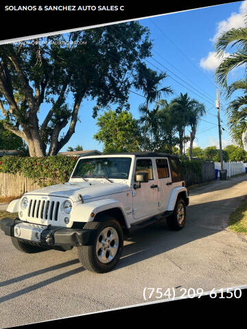 2015 Jeep Wrangler Unlimited for sale at SOLANOS & SANCHEZ AUTO SALES C in Hollywood FL