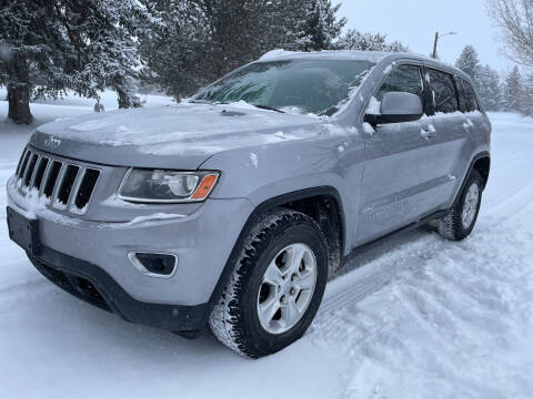 2014 Jeep Grand Cherokee for sale at BELOW BOOK AUTO SALES in Idaho Falls ID