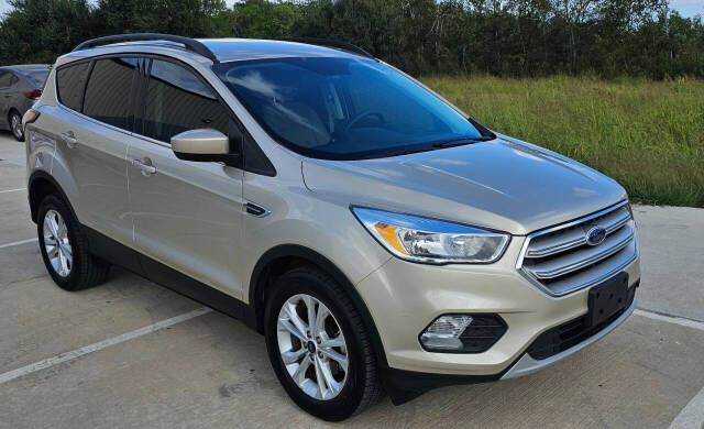 2018 Ford Escape for sale at CAR MARKET AUTO GROUP in Sugar Land, TX