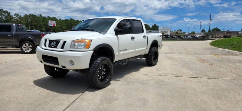 2013 Nissan Titan for sale at WHOLESALE AUTO GROUP in Mobile AL