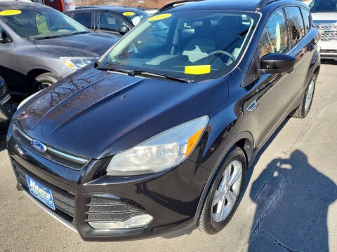 2014 Ford Escape for sale at Howe's Auto Sales LLC - Howe's Auto Sales in Lowell MA