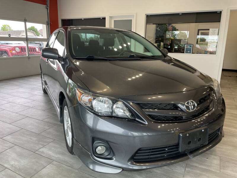 2011 Toyota Corolla for sale at Evolution Autos in Whiteland IN