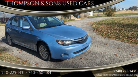 2011 Subaru Impreza for sale at THOMPSON & SONS USED CARS in Marion OH