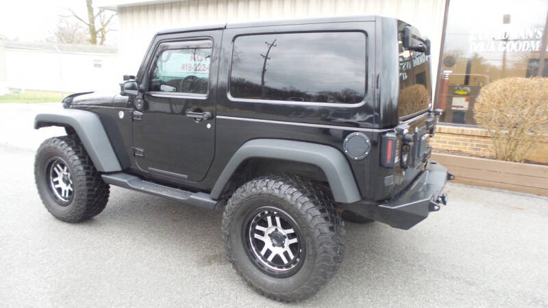 2013 Jeep Wrangler for sale at Goodman Auto Sales in Lima OH