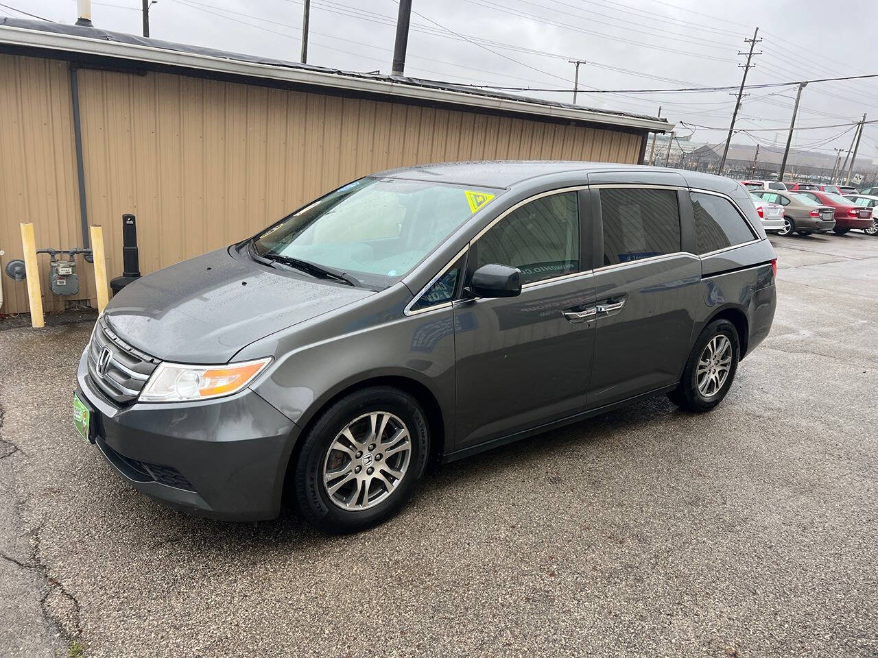 2013 Honda Odyssey for sale at BNM AUTO GROUP in GIRARD, OH