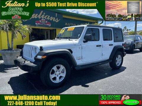 2018 Jeep Wrangler Unlimited for sale at Julians Auto Showcase in New Port Richey FL