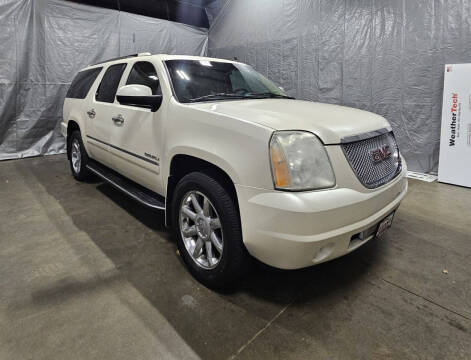 2011 GMC Yukon XL for sale at GRAND AUTO SALES in Grand Island NE