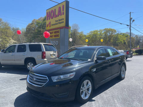 2013 Ford Taurus for sale at NO FULL COVERAGE AUTO SALES LLC in Austell GA