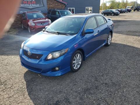 2009 Toyota Corolla for sale at Rick's R & R Wholesale, LLC in Lancaster OH