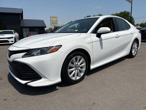 2018 Toyota Camry for sale at HUFF AUTO GROUP in Jackson MI