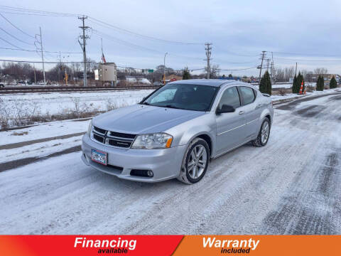 2011 Dodge Avenger for sale at Auto Star in Osseo MN