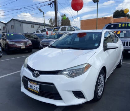 2015 Toyota Corolla for sale at La Mesa Auto Sales in Huntington Park CA