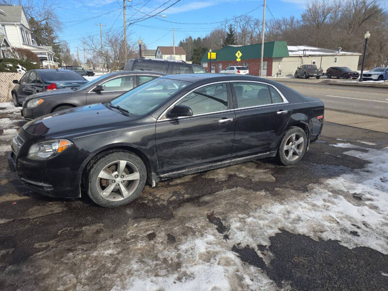 2012 Chevrolet Malibu for sale at Maximum Auto Group II INC in Cortland OH