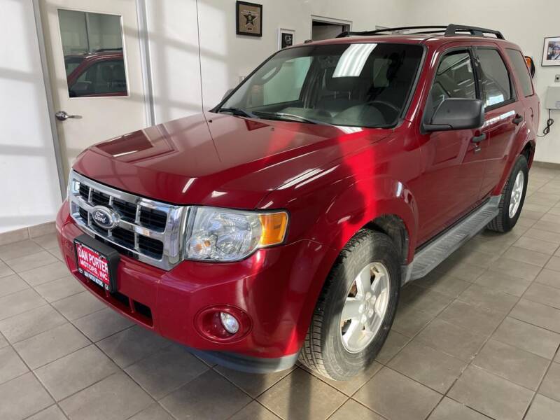 2011 Ford Escape for sale at DAN PORTER MOTORS in Dickinson ND